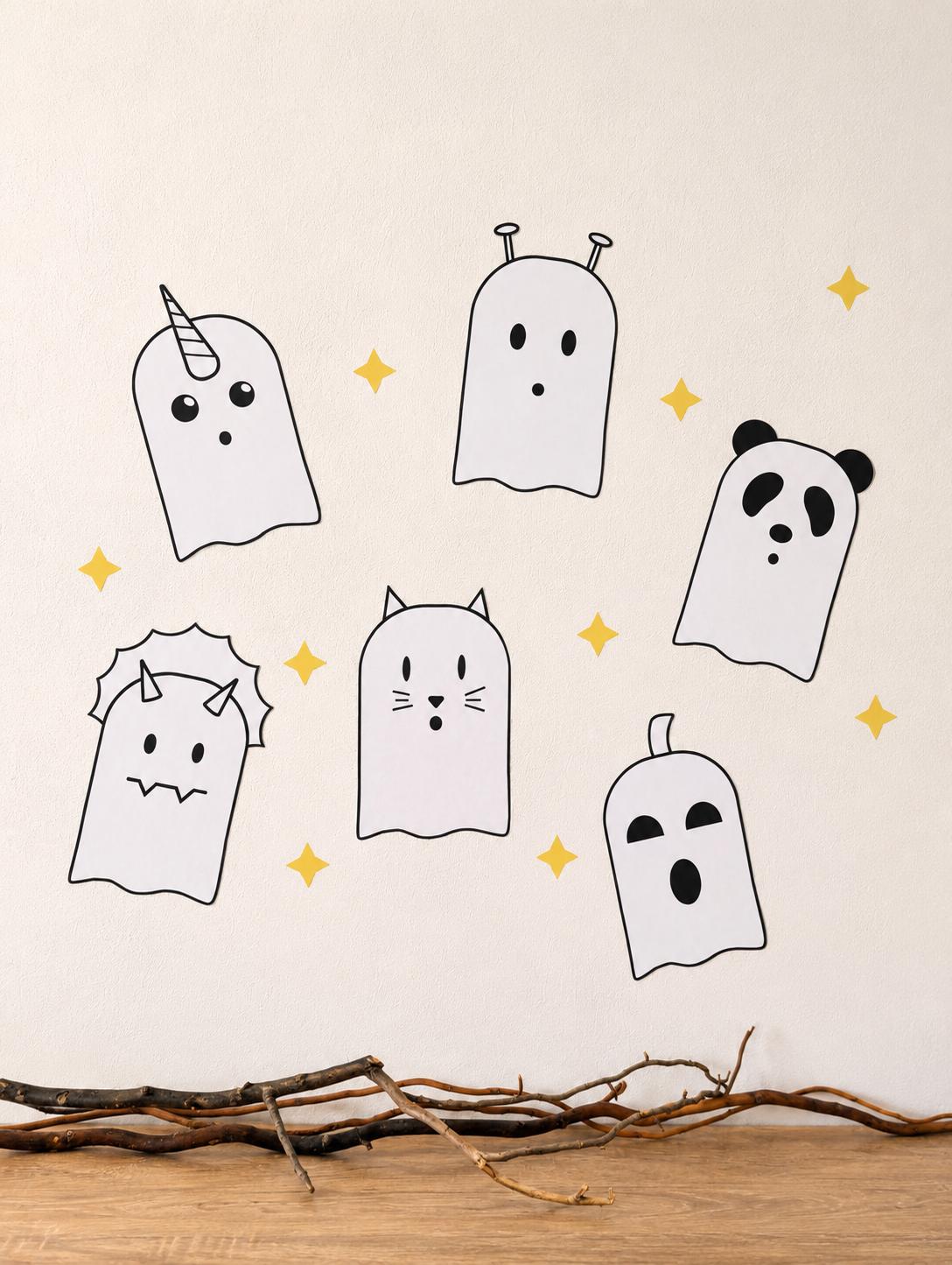 Six cute ghost wall decals on a cream wall