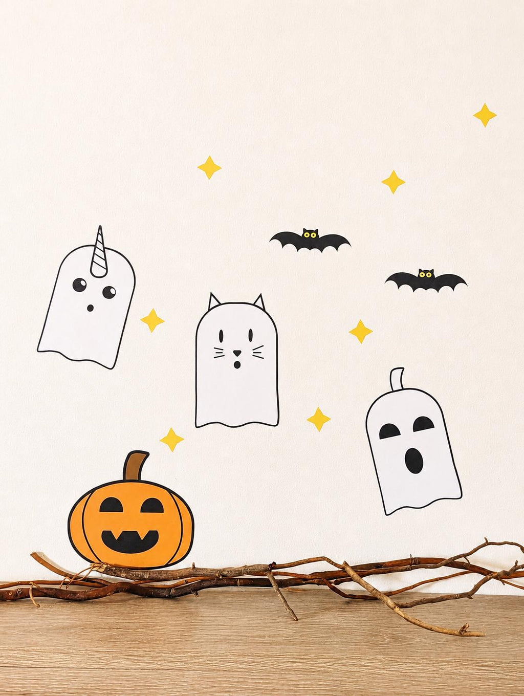 Ghost, bat and moon wall decals on a wall